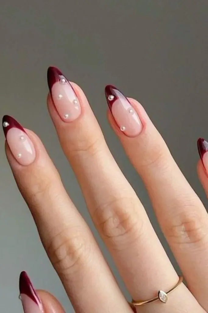 Velvet Red Nail Design with Pearl Accents